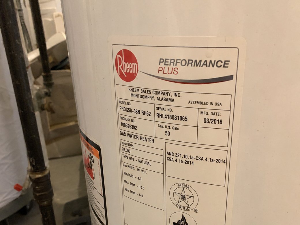 Rheem Performance Plus water heater label, showing model and serial number